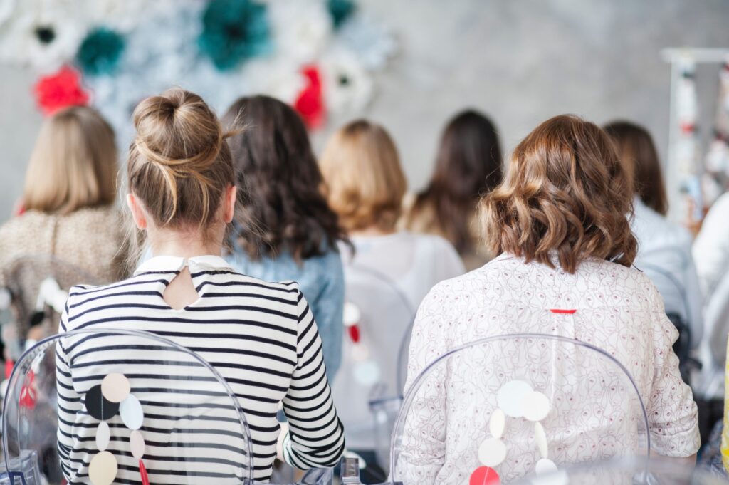 photo of two women attending a class